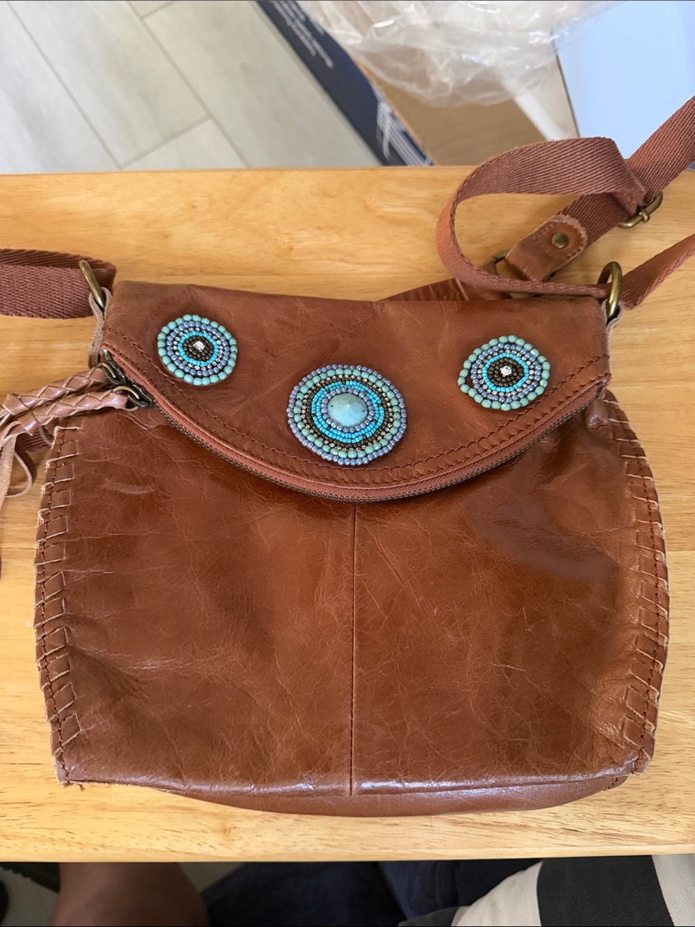 The Sak Brown Crossbody with Turquoise Bead Medallions